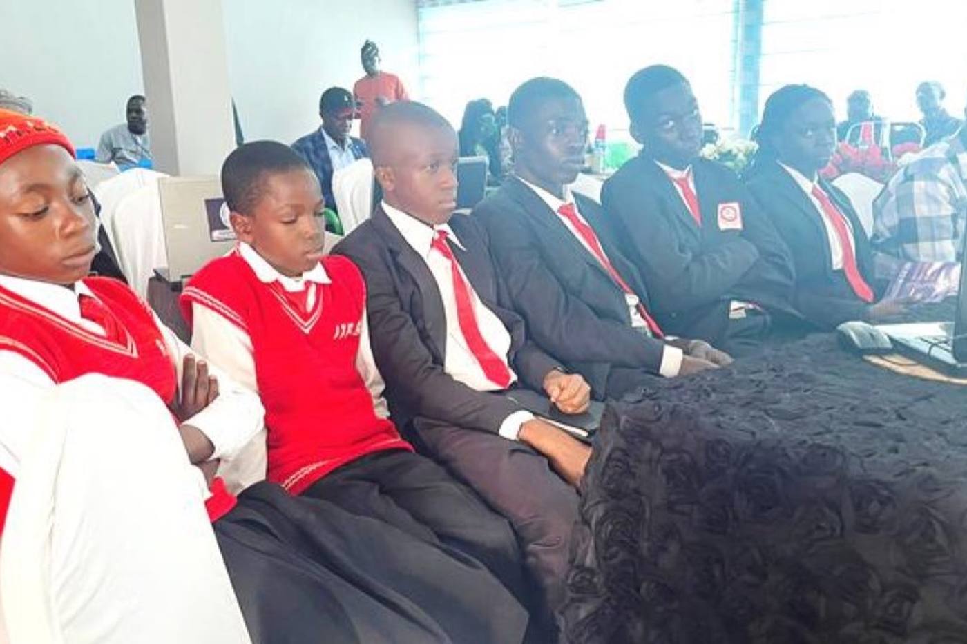 Secondary-school students in uniform seated together at the EduBot Naija launch.